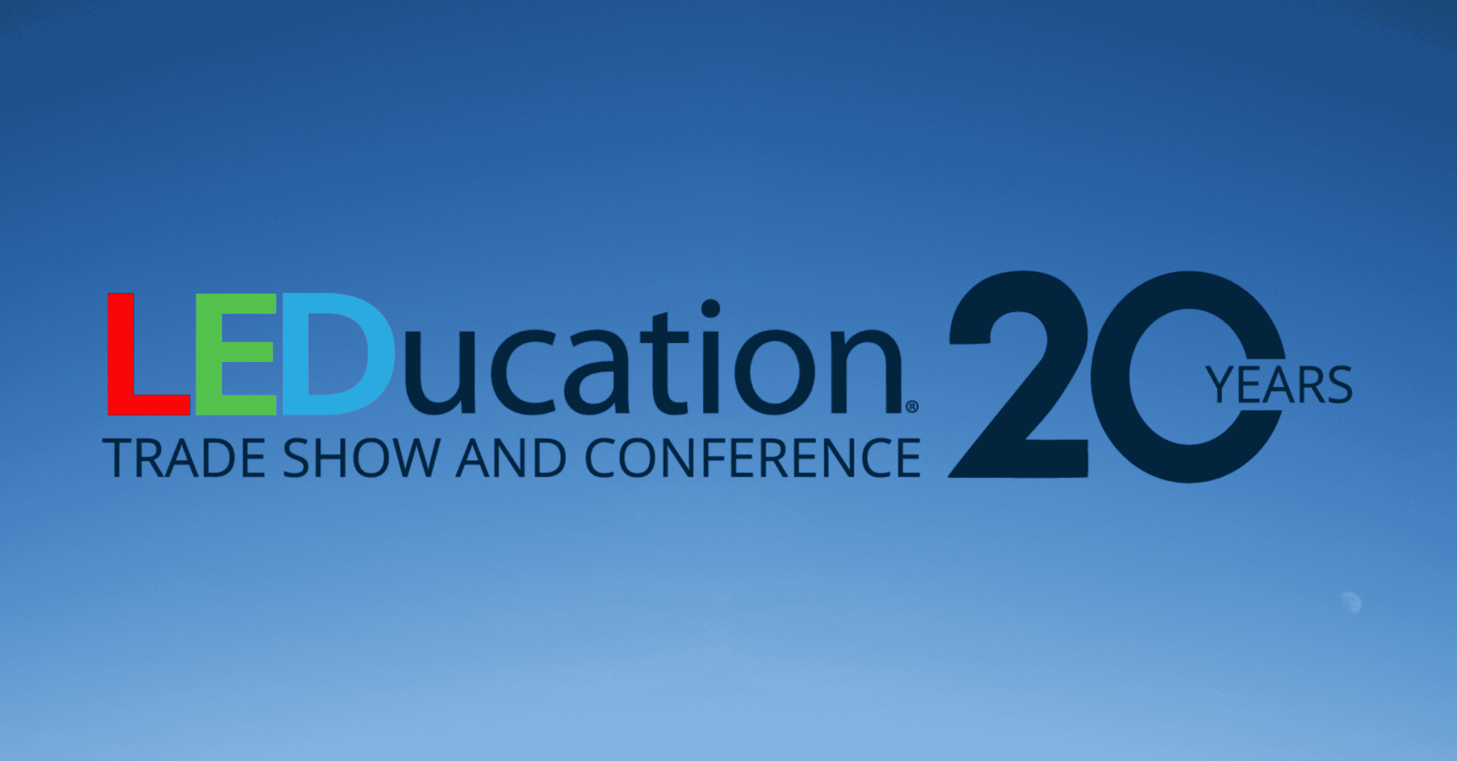 Blue sky background with 20th year anniversary LEDucation logo